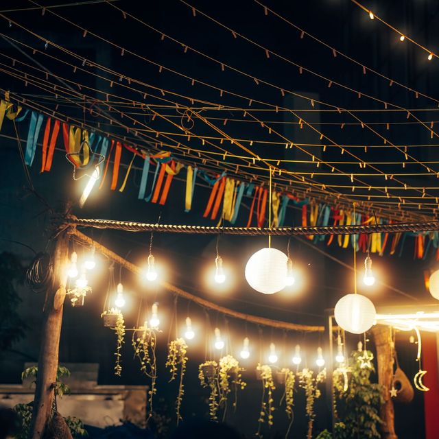 A lit outdoor celebration with room for several events